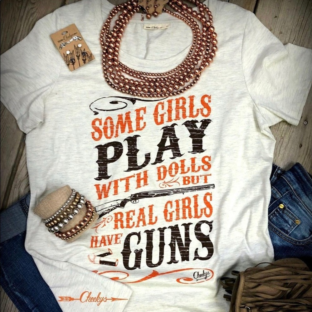 Some girls play with dolls.. T-shirt
